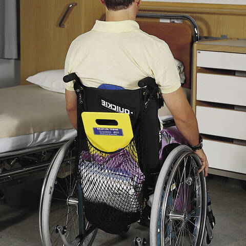 Seated patient transfer – Glideboard in use